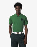 เสื้อโปโลผู้ชาย MINI PIQUÉ BADGE ACCENT STRETCH GOLF POLO SHIRT (Vert • 59X)