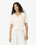 เสื้อโปโลผู้หญิง RELAXED FIT FLUID PIQUÉ POLO SHIRT (White • 70V)